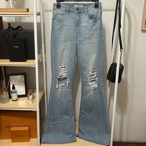 Hidden Los Angeles bell bottom jeans with distress . Never worn!
